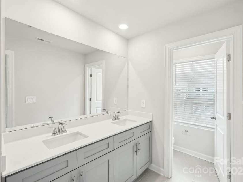 125 UTILITY Lane, Mooresville, NC 28117.  MLS# CAR4286424, YatesRealty ID 31643. Photo is not of the actual home, but is an inspirational photo of builder’s model home and may depict options, furnishings, and/or decorator features that are not included
