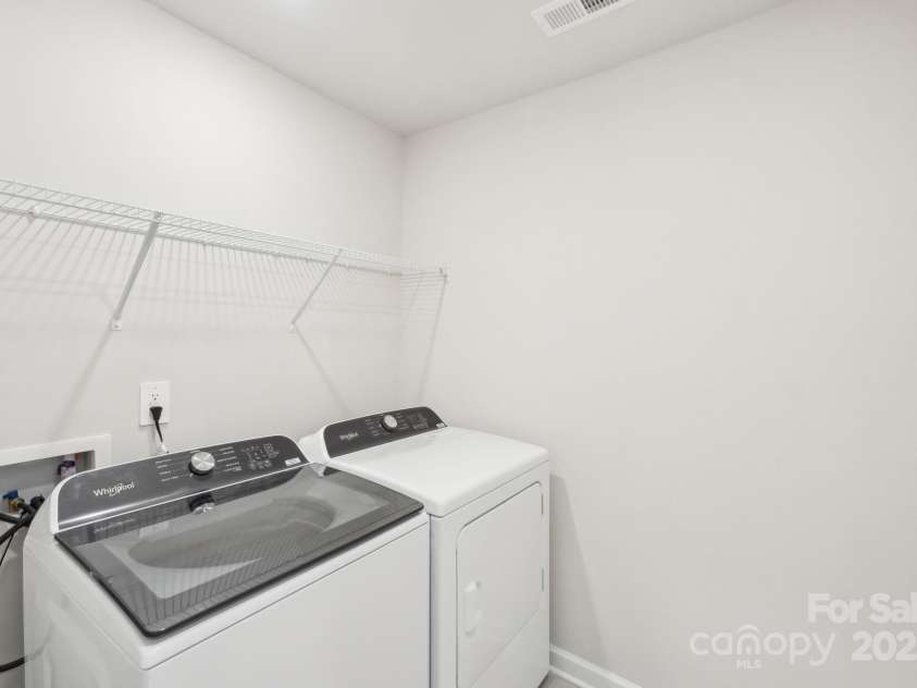 125 UTILITY Lane, Mooresville, NC 28117.  MLS# CAR4286424, YatesRealty ID 31643. Photo is not of the actual home, but is an inspirational photo of builder’s model home and may depict options, furnishings, and/or decorator features that are not included