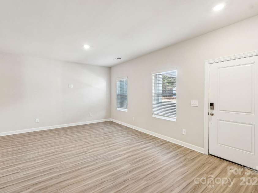 125 UTILITY Lane, Mooresville, NC 28117.  MLS# CAR4286425, YatesRealty ID 31643. Photo is not of the actual home, but is an inspirational photo of builder’s model home and may depict options, furnishings, and/or decorator features that are not included