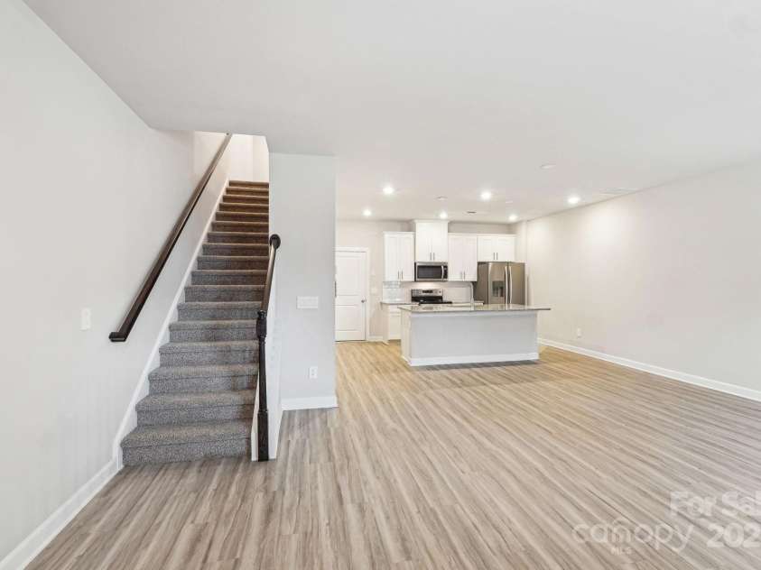 125 UTILITY Lane, Mooresville, NC 28117.  MLS# CAR4286425, YatesRealty ID 31643. Photo is not of the actual home, but is an inspirational photo of builder’s model home and may depict options, furnishings, and/or decorator features that are not included