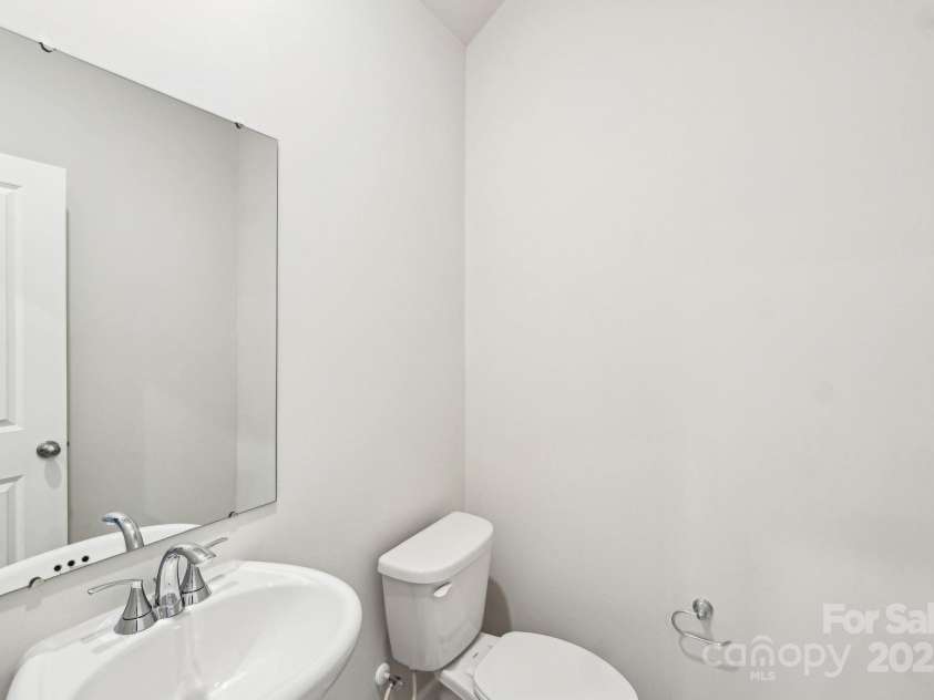 125 UTILITY Lane, Mooresville, NC 28117.  MLS# CAR4286425, YatesRealty ID 31643. Photo is not of the actual home, but is an inspirational photo of builder’s model home and may depict options, furnishings, and/or decorator features that are not included