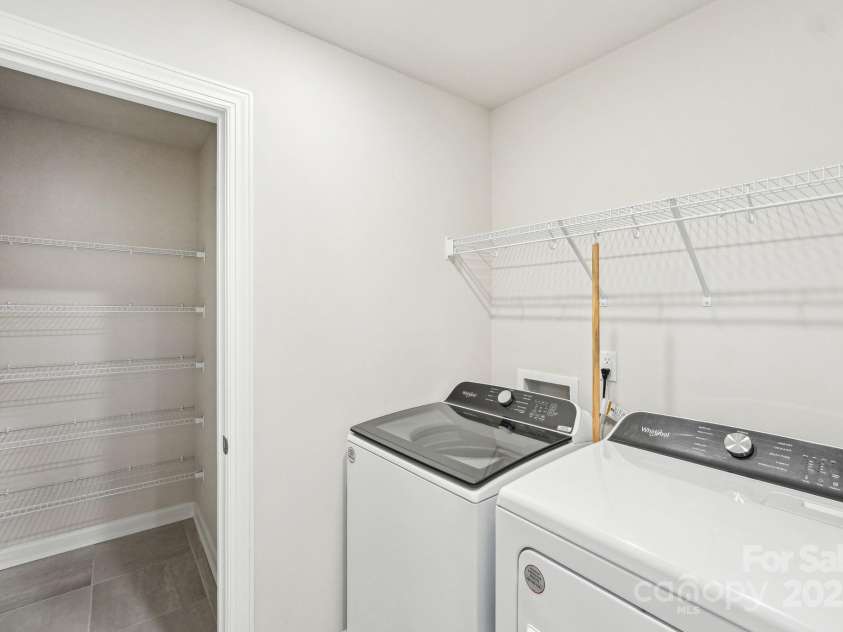 125 UTILITY Lane, Mooresville, NC 28117.  MLS# CAR4286425, YatesRealty ID 31643. Photo is not of the actual home, but is an inspirational photo of builder’s model home and may depict options, furnishings, and/or decorator features that are not included