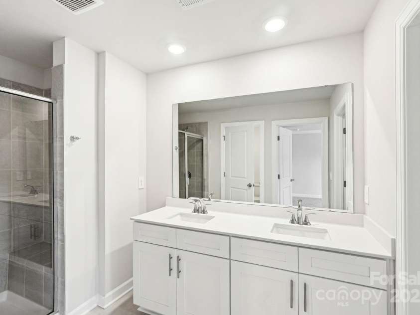 125 UTILITY Lane, Mooresville, NC 28117.  MLS# CAR4286425, YatesRealty ID 31643. Photo is not of the actual home, but is an inspirational photo of builder’s model home and may depict options, furnishings, and/or decorator features that are not included