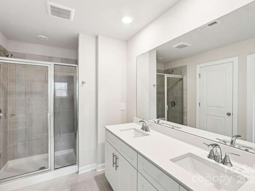 125 UTILITY Lane, Mooresville, NC 28117.  MLS# CAR4286425, YatesRealty ID 31643. Photo is not of the actual home, but is an inspirational photo of builder’s model home and may depict options, furnishings, and/or decorator features that are not included