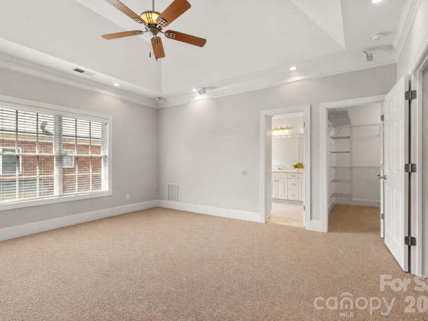 705 Congressional Lane, Fort Mill, SC 29708.  MLS# CAR4371398, YatesRealty ID 31643. Spacious primary suite with tray ceiling.