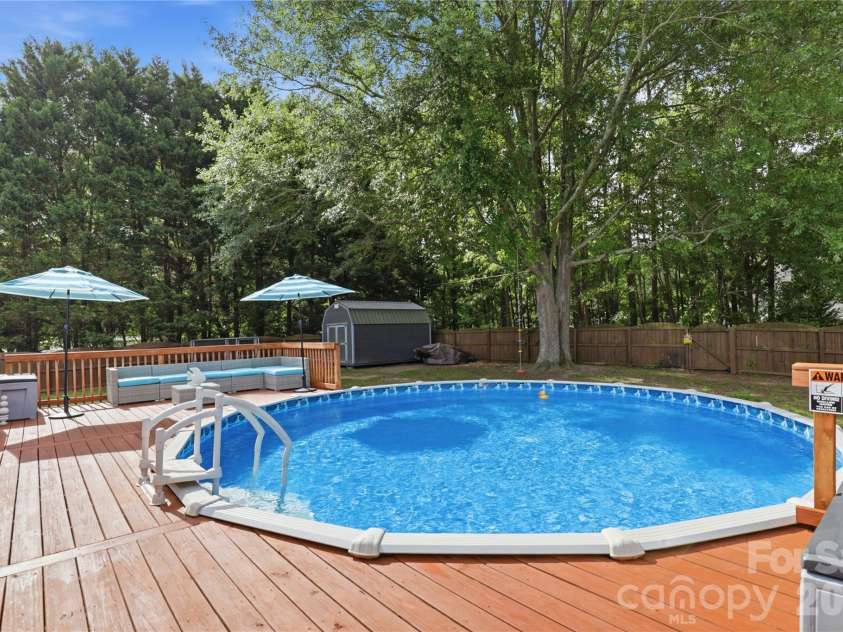 1689 Willowbrook Drive, Fort Mill, SC 29708.  MLS# CAR4376340, YatesRealty ID 31644. Pool - Blue World Pools 2022