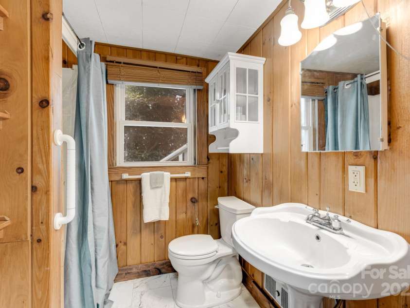 203 Laurel Lane, Little Switzerland, NC 28749.  MLS# CAR4276021, YatesRealty ID 31644. 