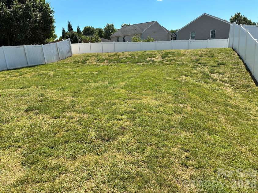 9315 Carrot Patch Drive, Charlotte, NC 28216.  MLS# CAR4377265, YatesRealty ID 31645. Large backyard