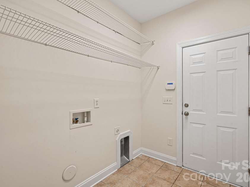 11215 Warfield Avenue, Huntersville, NC 28078.  MLS# CAR4376014, YatesRealty ID 31646. Laundry Room