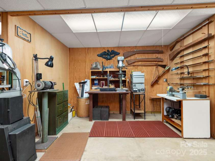 116 Sams Branch Road, Candler, NC 28715.  MLS# CAR4137587, YatesRealty ID 3165. Finished space that could become storage, your shop, or addition hang out space