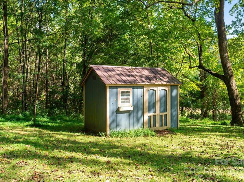 116 Sams Branch Road, Candler, NC 28715.  MLS# CAR4137587, YatesRealty ID 3165. One of several sheds 
