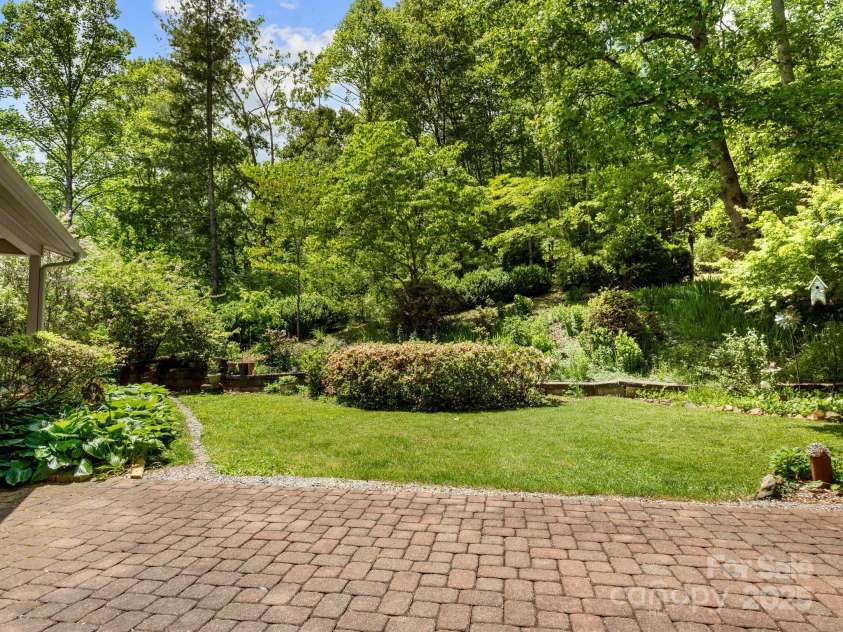 116 Sams Branch Road, Candler, NC 28715.  MLS# CAR4137587, YatesRealty ID 3165. Privacy and mature plantings