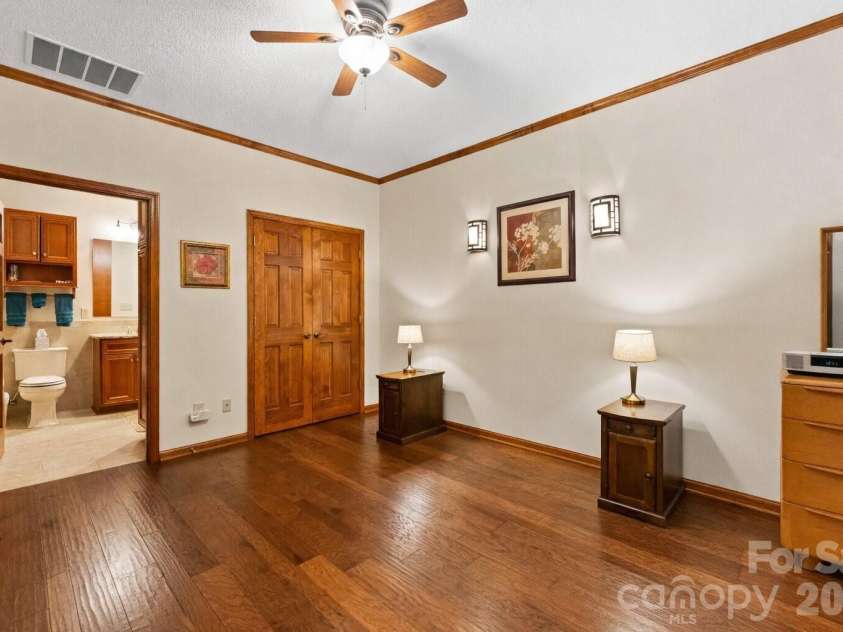 5030 Samuel Pinckney Drive, Belmont, NC 28012.  MLS# CAR4353587, YatesRealty ID 3165. Main level guest suite BR