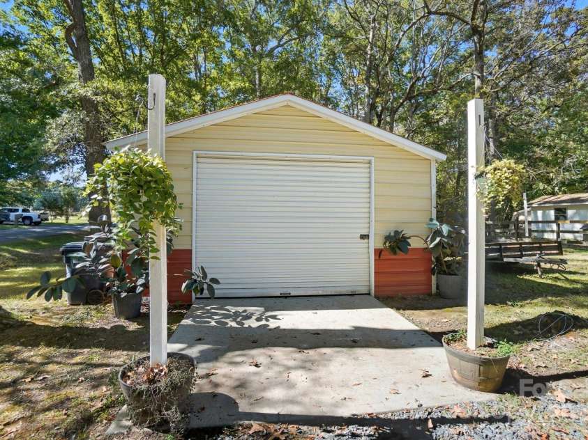 109 Carter Road, Monroe, NC 28110.  MLS# CAR4312358, YatesRealty ID 31656. Detached garage