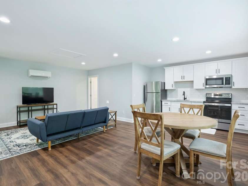 1617 Hawthorne Lane, Charlotte, NC 28205.  MLS# CAR4383885, YatesRealty ID 31657. Dining Area and Kitchen
