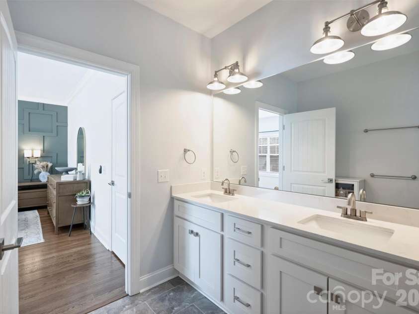 1617 Hawthorne Lane, Charlotte, NC 28205.  MLS# CAR4383885, YatesRealty ID 31657. Dual sinks in Primary Bath