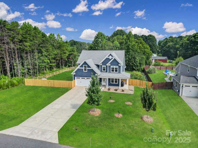 107 Collins Grove Court, Mooresville, NC 28115.  MLS# CAR4281095, YatesRealty ID 31658. Front Aerial View - Grass virtually enhanced