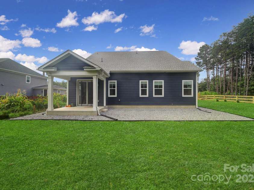 107 Collins Grove Court, Mooresville, NC 28115.  MLS# CAR4281095, YatesRealty ID 31658. Rear of Home - Grass virtually enhanced