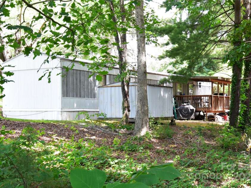 295 Asbury Road, Candler, NC 28715.  MLS# CAR4308375, YatesRealty ID 3166. 