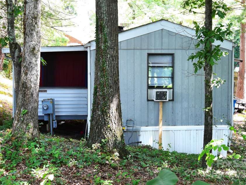 295 Asbury Road, Candler, NC 28715.  MLS# CAR4308375, YatesRealty ID 3166. 