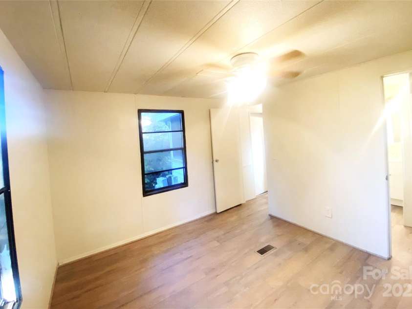 295 Asbury Road, Candler, NC 28715.  MLS# CAR4308375, YatesRealty ID 3166. 