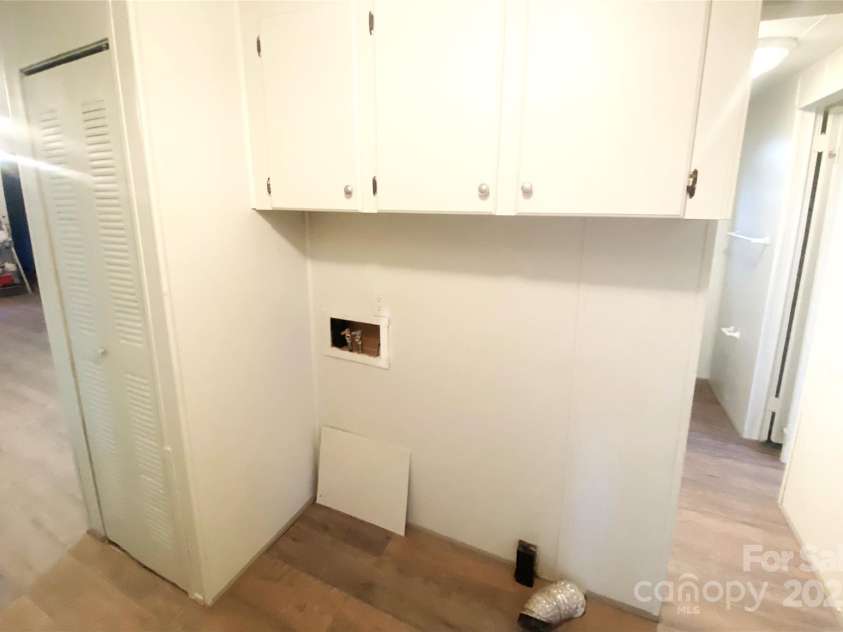 295 Asbury Road, Candler, NC 28715.  MLS# CAR4308375, YatesRealty ID 3166. 