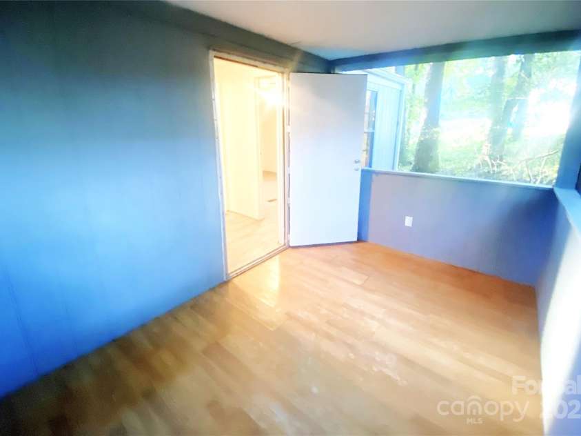 295 Asbury Road, Candler, NC 28715.  MLS# CAR4308375, YatesRealty ID 3166. 