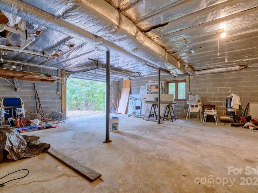 17 Heritage Drive, Lake Wylie, SC 29710.  MLS# CAR4276829, YatesRealty ID 31664. Basment with garage entry used for golf cart