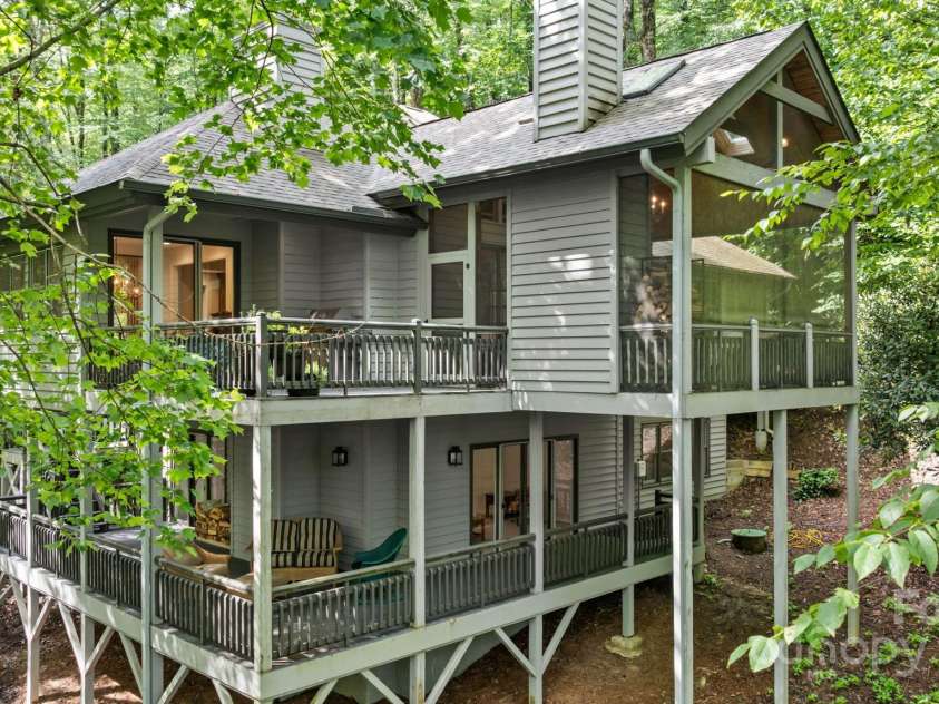 16 Hemlock Way, Highlands, NC 28741.  MLS# CAR4286772, YatesRealty ID 31668. Wrap Around Decks on Both Levels