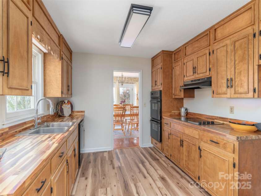 80 Gobblers Knob Drive, Clyde, NC 28721.  MLS# CAR4272798, YatesRealty ID 31672. Access to several areas of the home through the kitchen