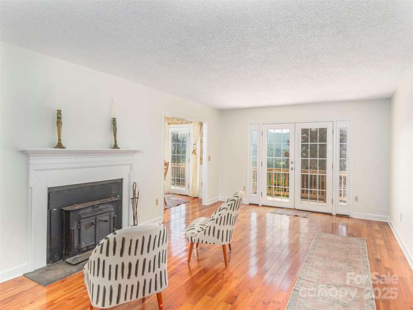 80 Gobblers Knob Drive, Clyde, NC 28721.  MLS# CAR4272798, YatesRealty ID 31672. Large traditional great room