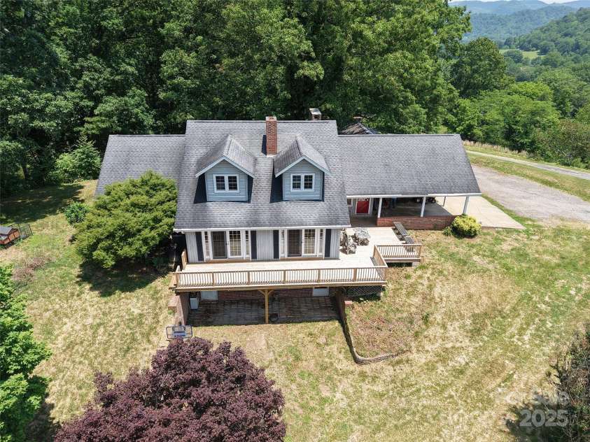 80 Gobblers Knob Drive, Clyde, NC 28721.  MLS# CAR4272798, YatesRealty ID 31672. New deck off the home for outdoor enjoyment