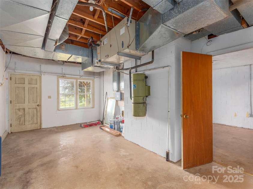 80 Gobblers Knob Drive, Clyde, NC 28721.  MLS# CAR4272798, YatesRealty ID 31672. Plenty of storage, cella, workshop….possibilities are waiting for yourideas