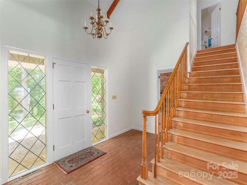 80 Gobblers Knob Drive, Clyde, NC 28721.  MLS# CAR4272798, YatesRealty ID 31672. Step inside
