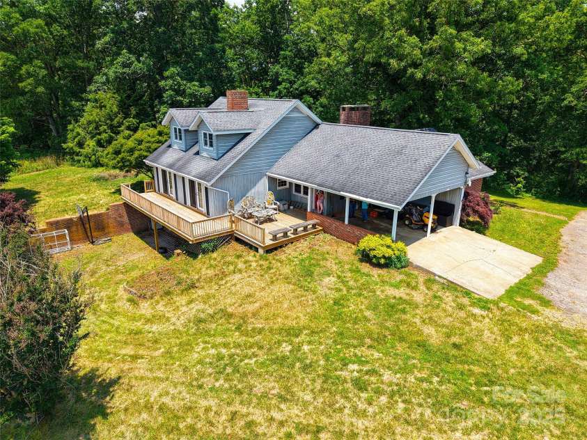 80 Gobblers Knob Drive, Clyde, NC 28721.  MLS# CAR4272798, YatesRealty ID 31672. Yard and sunshine for all sorts of hobbies