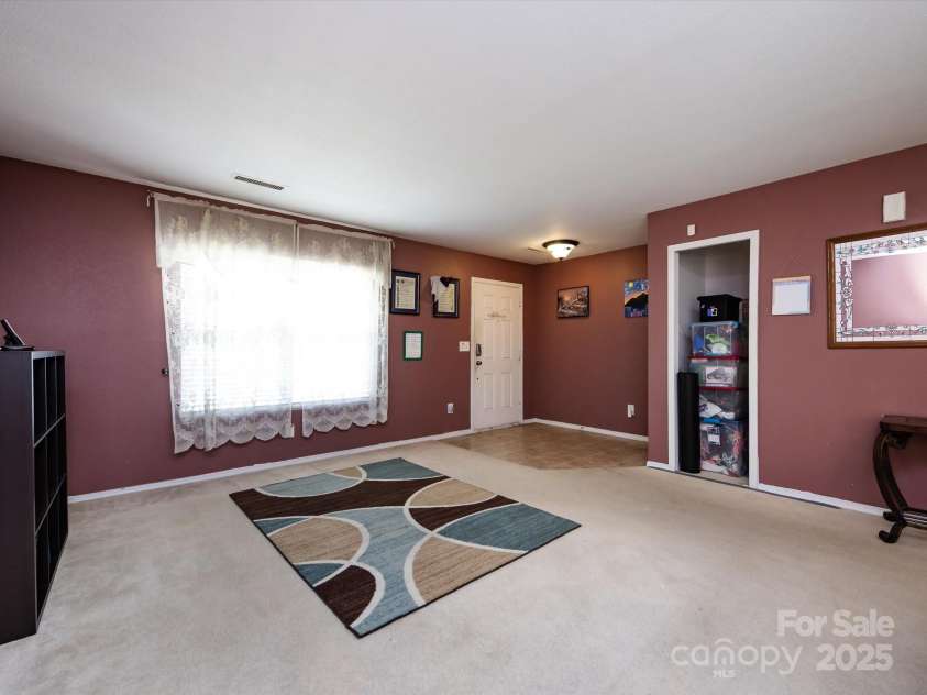 8214 Ainsworth Street, Charlotte, NC 28216.  MLS# CAR4283706, YatesRealty ID 31674. Entryway/Living Room