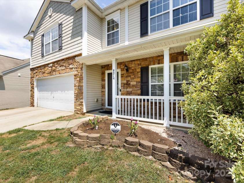 8214 Ainsworth Street, Charlotte, NC 28216.  MLS# CAR4283706, YatesRealty ID 31674. Front porch