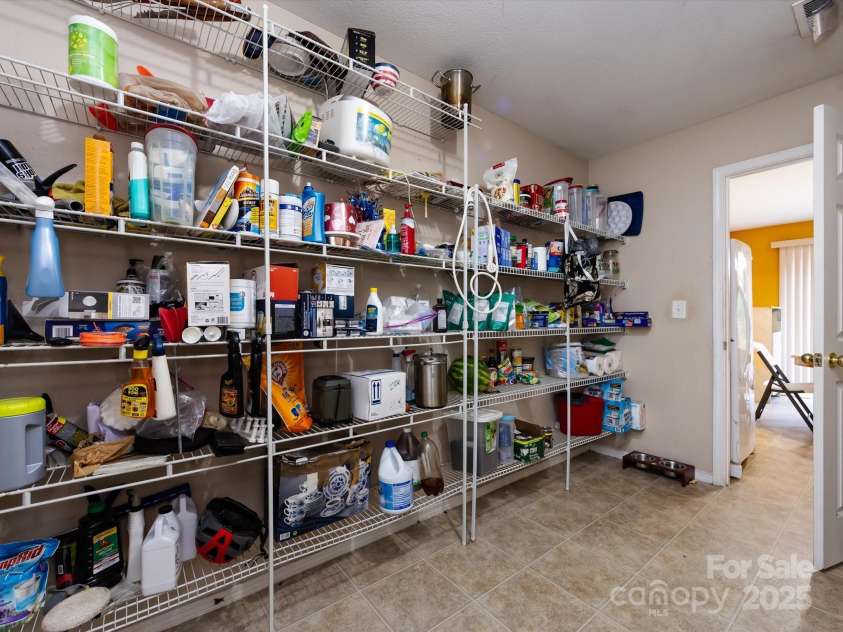 8214 Ainsworth Street, Charlotte, NC 28216.  MLS# CAR4283706, YatesRealty ID 31674. Huge Pantry!