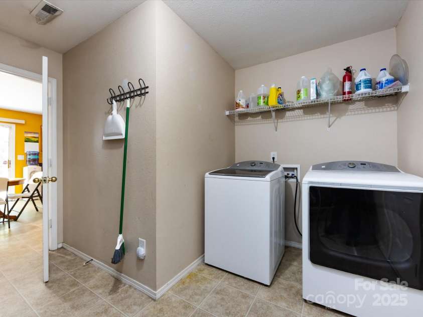 8214 Ainsworth Street, Charlotte, NC 28216.  MLS# CAR4283706, YatesRealty ID 31674. Laundry Room