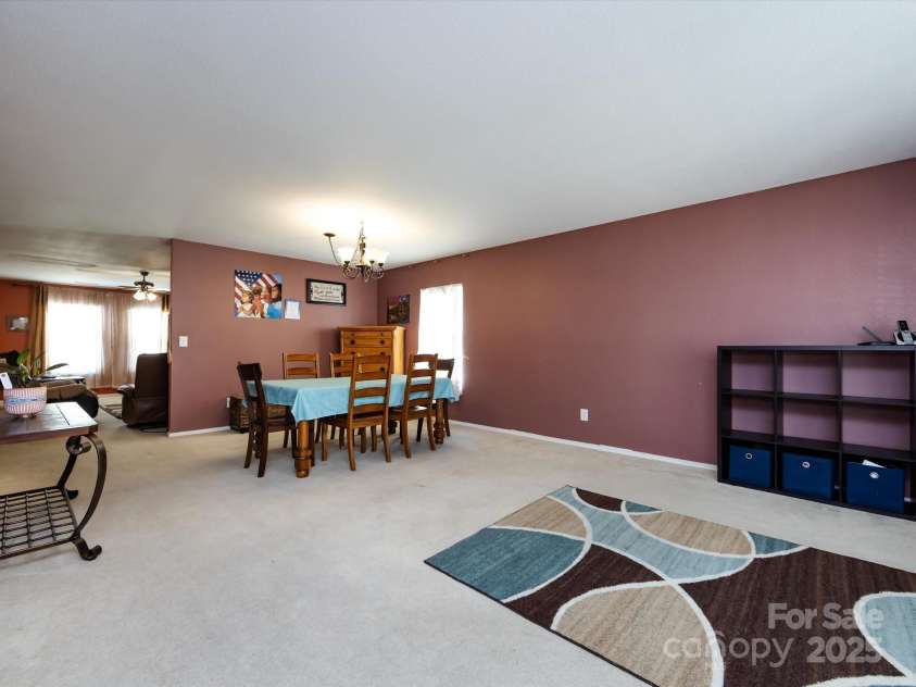 8214 Ainsworth Street, Charlotte, NC 28216.  MLS# CAR4283706, YatesRealty ID 31674. Living Room/Dining Room