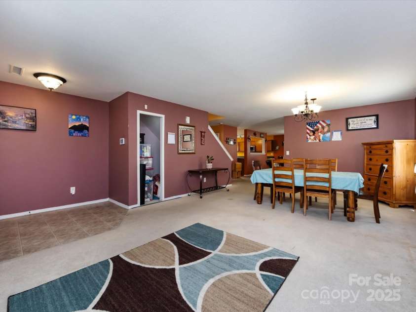 8214 Ainsworth Street, Charlotte, NC 28216.  MLS# CAR4283706, YatesRealty ID 31674. Living Room/Dining Room