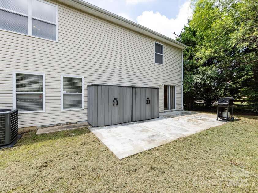 8214 Ainsworth Street, Charlotte, NC 28216.  MLS# CAR4283706, YatesRealty ID 31674. Patio/Backyard