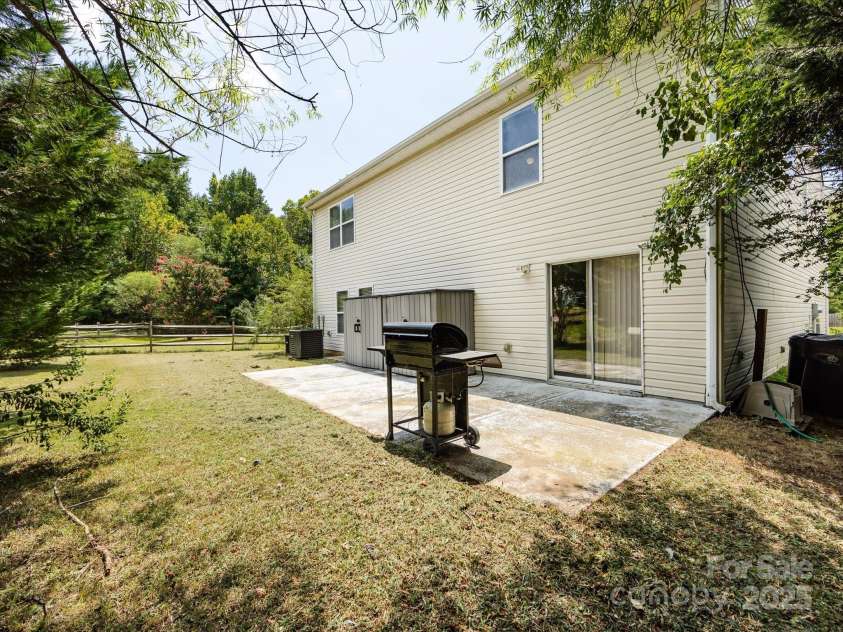 8214 Ainsworth Street, Charlotte, NC 28216.  MLS# CAR4283706, YatesRealty ID 31674. Patio/Backyard