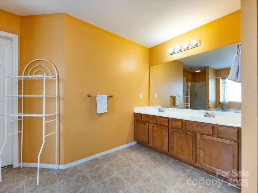 8214 Ainsworth Street, Charlotte, NC 28216.  MLS# CAR4283706, YatesRealty ID 31674. Primary Bathroom