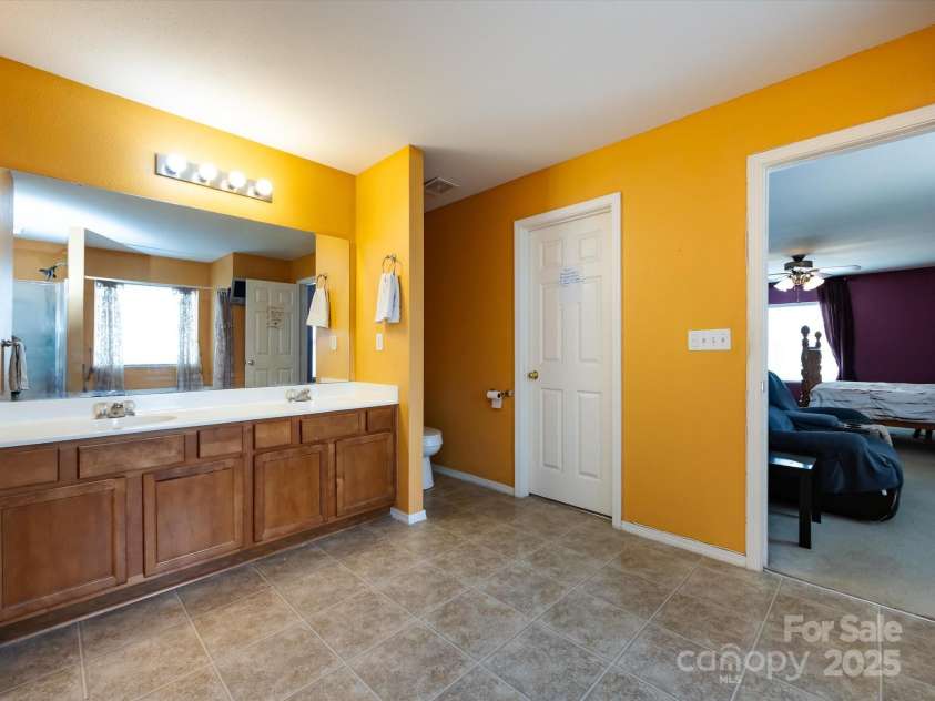 8214 Ainsworth Street, Charlotte, NC 28216.  MLS# CAR4283706, YatesRealty ID 31674. Primary Bathroom