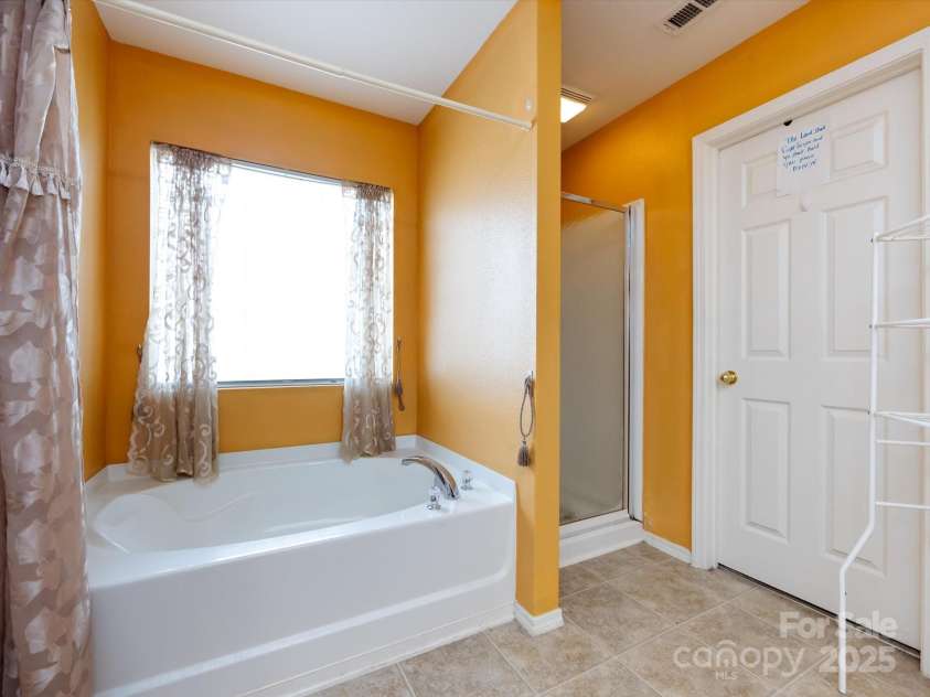 8214 Ainsworth Street, Charlotte, NC 28216.  MLS# CAR4283706, YatesRealty ID 31674. Primary Bathroom