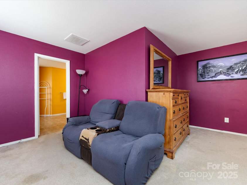 8214 Ainsworth Street, Charlotte, NC 28216.  MLS# CAR4283706, YatesRealty ID 31674. Primary Bedroom Sitting Area