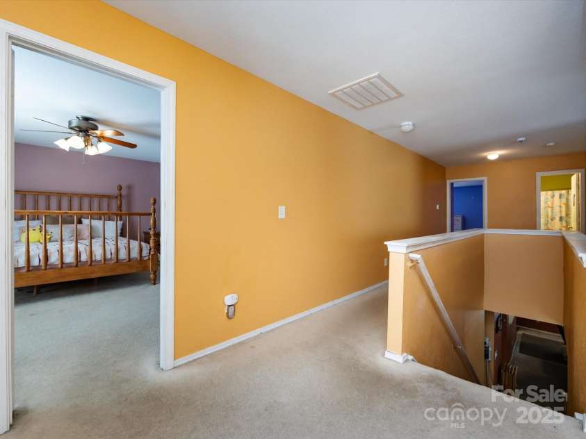 8214 Ainsworth Street, Charlotte, NC 28216.  MLS# CAR4283706, YatesRealty ID 31674. Upstairs Landing