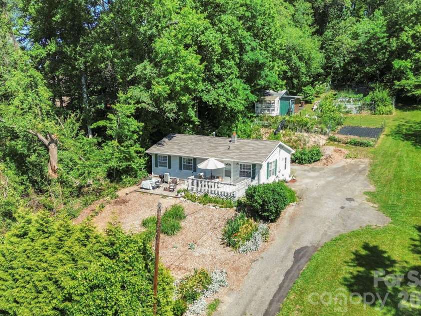 658 Enka Lake Road, Candler, NC 28715.  MLS# CAR4395073, YatesRealty ID 31676. 
