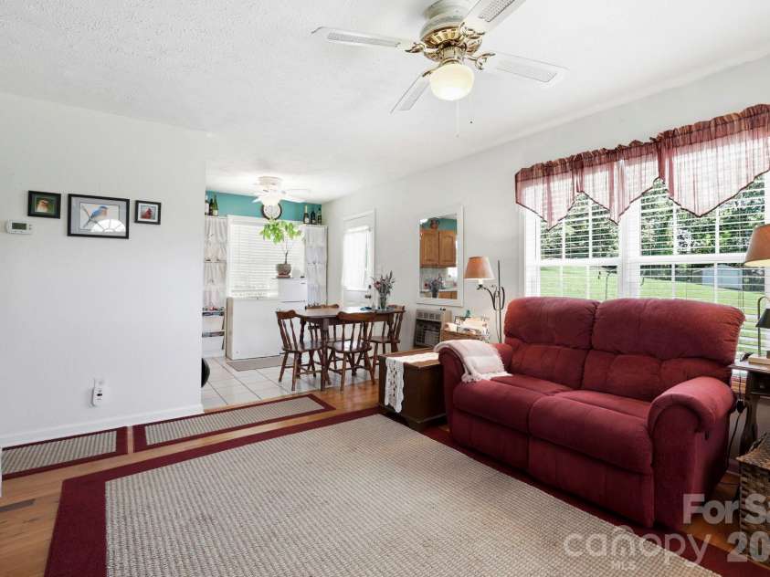 658 Enka Lake Road, Candler, NC 28715.  MLS# CAR4395073, YatesRealty ID 31676. 
